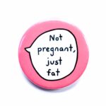 'Not pregnant, just fat' pin badge with pink background