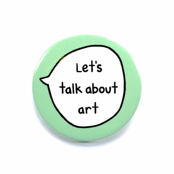 'Let's talk about art' pin badge with mint green background