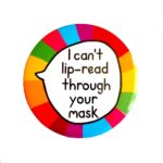 'I can't lip read through your mask' pin badge with rainbow background