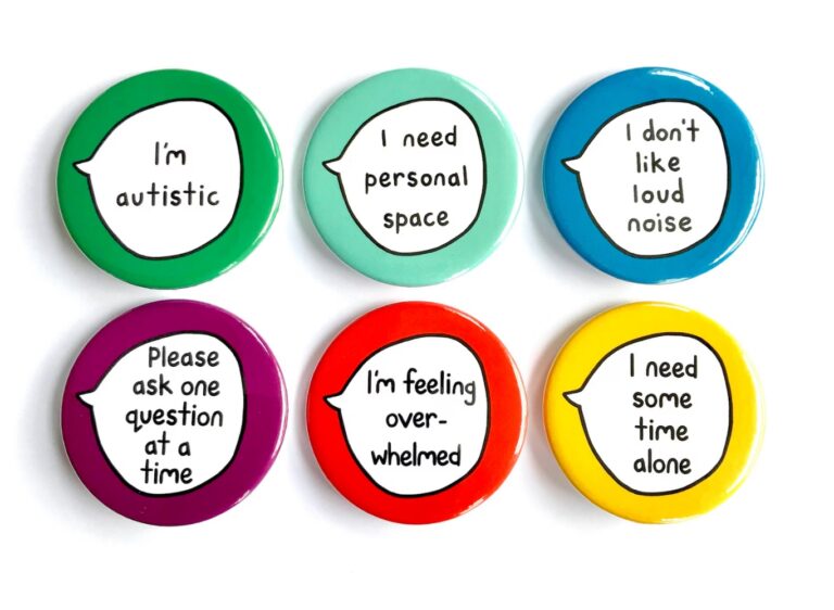 A range of pin badges to raise awareness of neurodiversity